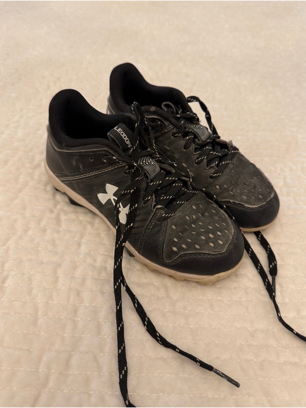 Under Armour Baseball Cleats With White Logo